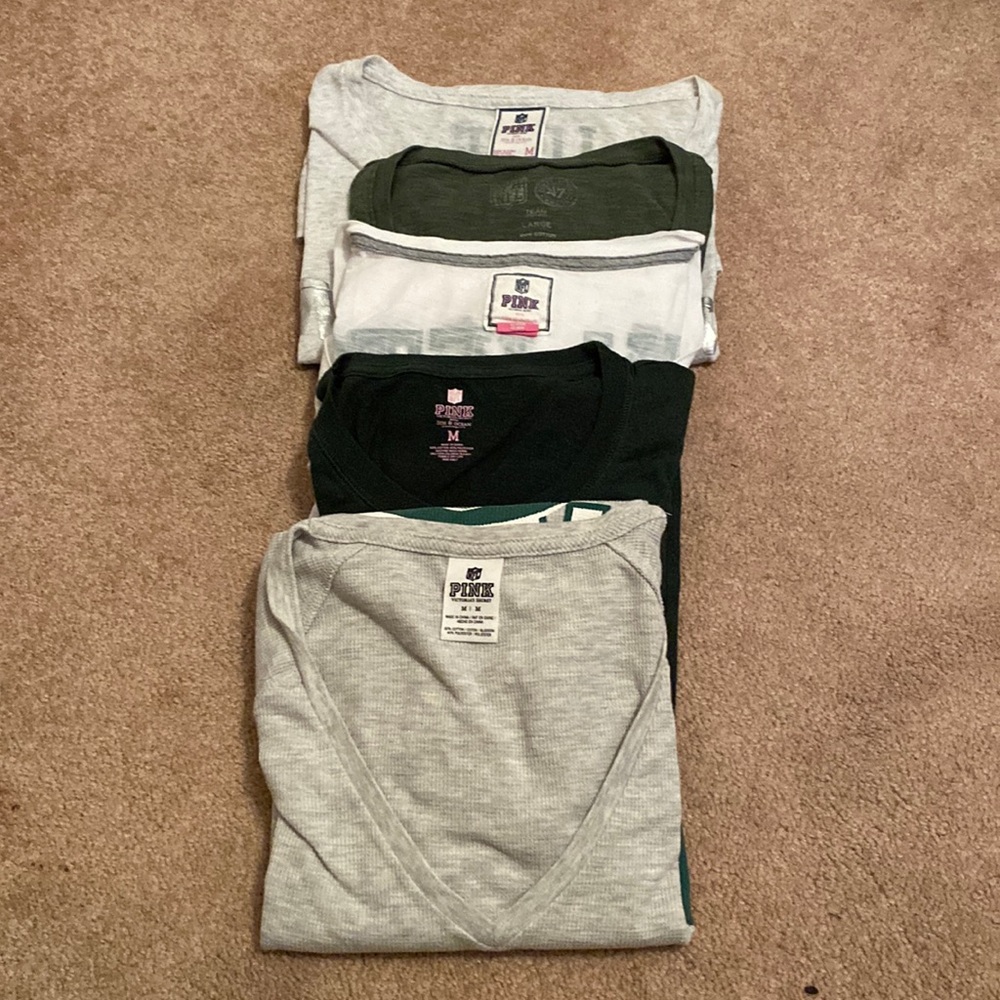 5 NY Jets ladies shirts, size medium & large. Perfect for a size 10 gal